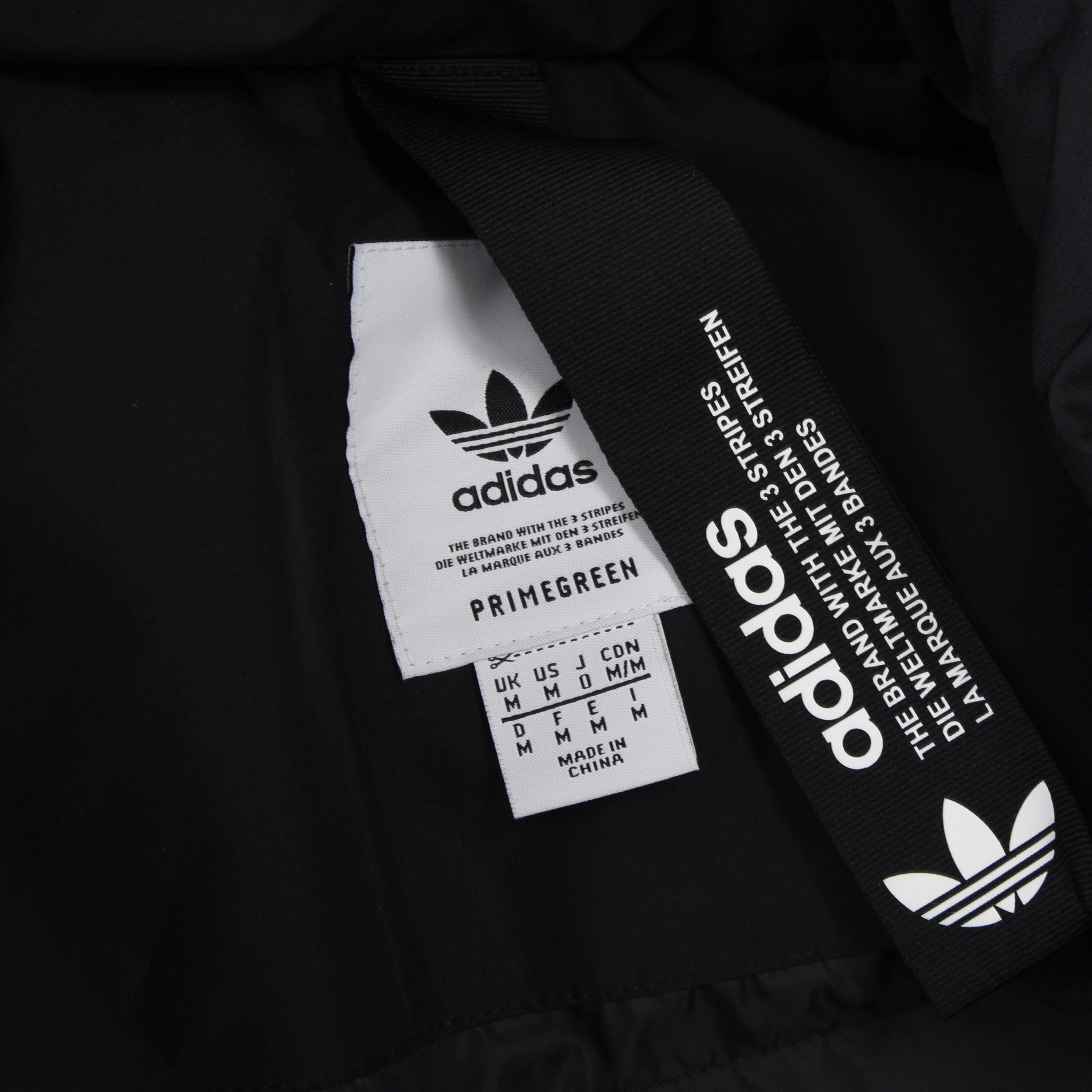 the brand with the 3 stripes jacket