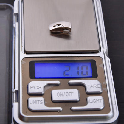 Feichtinger Anhänger „Eve“  585 / 14kt Weißgold mit einem Brillanten von 0,06 ct. 