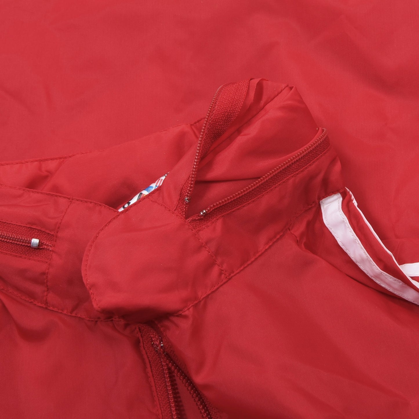 Vintage Adidas Nylon Regenjacke Größe D44 ca. 56cm - Rot