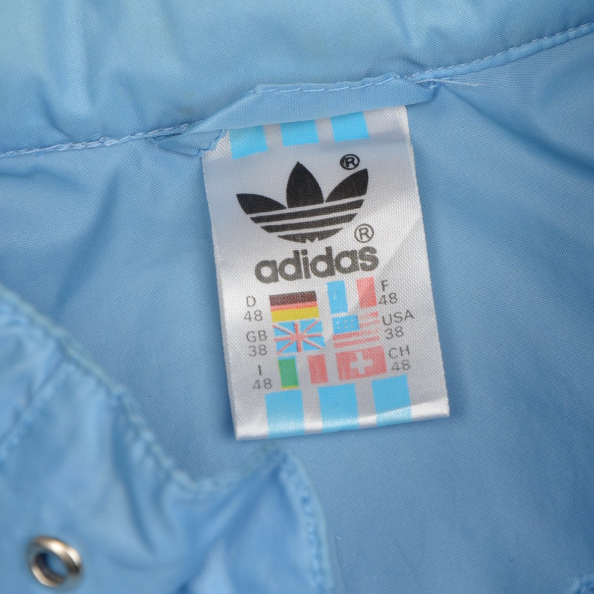 Vintage 80er Jahre Adidas Packable Nylon Regenjacke Größe 48/38 - Himmelblau